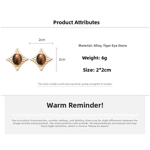 Detailed macro view showing tiger eye stone earrings with size and weight parameters