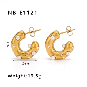 Detail view of 18K gold plated C-shape earrings with pearls and zircon, 1.9cm size