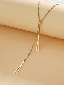 Detail of adjustable golden Y-necklace with geometric hollow triangle pendants