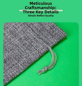Detailed close-up of grey burlap drawstring bag texture and durable woven cord closure