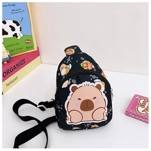 Detail of black nylon kids chest bag with Capybara print and adjustable strap