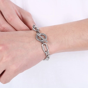 Industrial 10mm silver link chain bracelet with OT toggle clasp on wrist