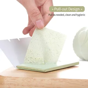 Green tea facial oil blotting sheets in an easy-to-use pop-up dispenser box