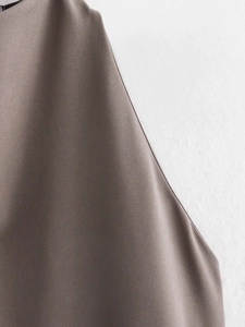 Detailed macro view of medium grey twill fabric showing fine texture and draped finish
