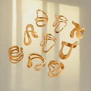 Modern 9-piece gold stainless steel ring set with minimalist and pavé crystal designs