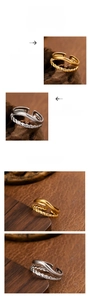 Detail of vintage dual-layer twisted gold and silver plated titanium steel rings