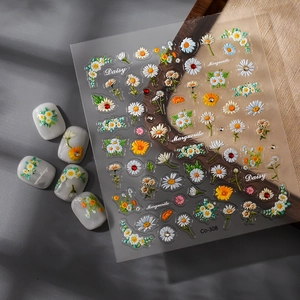3D floral daisy nail art stickers with delicate crystal accents and decorative rhinestones