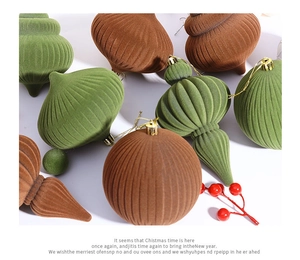 Detailed view of forest green and chocolate velvet Christmas ornaments with golden caps