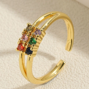 Close-up of golden double-layer open ring featuring vibrant multi-colored round zircons