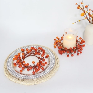 Autumn orange berry candle rings and festive table wreaths for Thanksgiving decoration