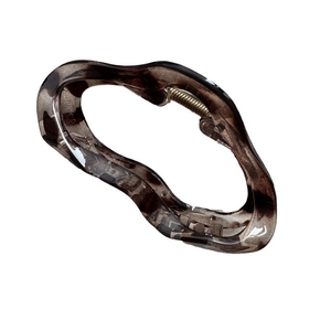 Brown tortoise shell cloud-shaped hair claw clip for thick hair on white background