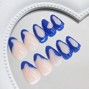 Blue 3D wave French almond press on nails with mirror finish on white background