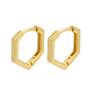 Detailed view of two minimalist hexagonal gold metal earrings on a clean white background