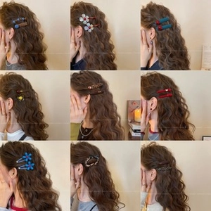 Collage of pearl hair clips in various shapes like hearts and flowers worn by a model