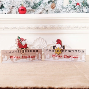 Detail view of wooden Christmas countdown calendar blocks with Santa and gnome sliders