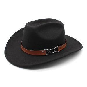 Detail of black fedora with brown leather band and silver metal chain link decoration