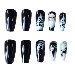 Christmas press-on nails set with Santa, reindeer, and snowy tree in long coffin shape