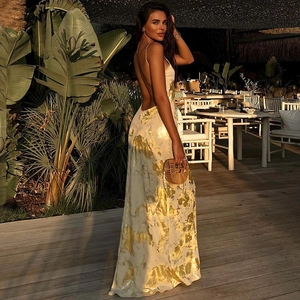 Elegant backless maxi dress with gold marble print and satin finish for summer