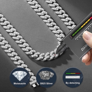 S925 sterling silver moissanite Cuban link necklace being tested with diamond selector