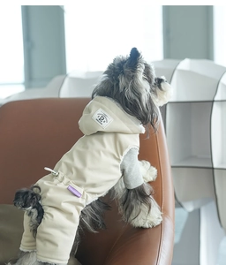 Detail view of pet hooded coat with soft fleece lining and back leash opening for dogs