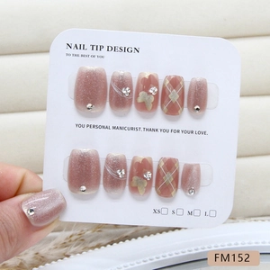 Pink purple cat eye press-on nails with golden butterflies and sparkly crystal accents