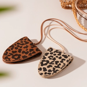 Leopard print faux suede triangle glasses case with magnetic closure and lanyard cord