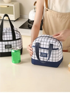 Detail of insulated plaid lunch bags with durable oxford fabric and reinforced handles