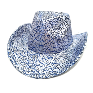 Detailed view of silver cowboy hat with blue shattered ice texture and visible stitching