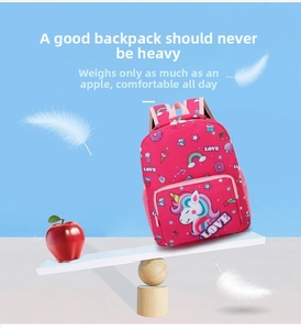Lightweight pink unicorn kids backpack on a scale showing ultra-light portable design
