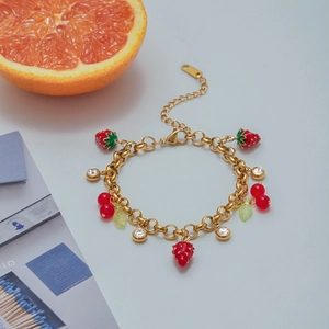 18K gold plated titanium bracelet featuring red enamel strawberry and cherry charms