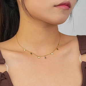 Minimalist S925 sterling silver necklace with square black zircon worn on model's neck