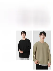 Close-up detail of the crewneck sweatshirt fabric and loose fit casual shoulder design