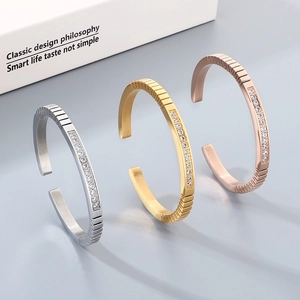 Three-color minimalist stainless steel open bangles with zircon inlay and ribbed texture