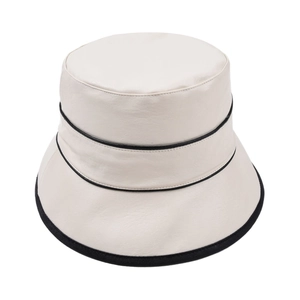 Minimalist cream white PU leather bucket hat with elegant black contrast piping detail