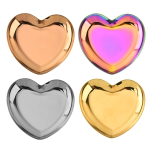 Polished heart-shaped stainless steel storage trays in gold, rose gold, silver and rainbow