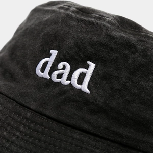 Faded black washed cotton fisherman bucket hat with white dad embroidery detail