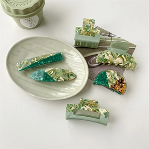 Detailed set of olive green and tortoiseshell marble textured acetate hair claw clips