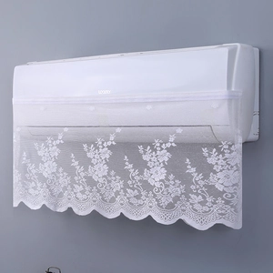 Detailed view of white floral lace air conditioner cover with delicate embroidery texture