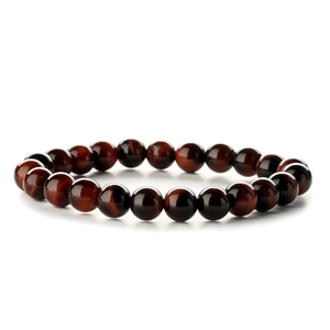 Polished 8mm red tiger eye bead bracelet with natural chatoyancy on white background