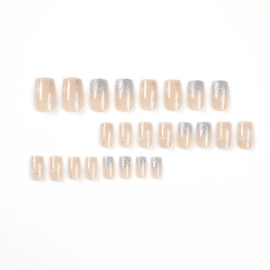 Pink press-on nails set with silver glitter clouds and star patterns on white background
