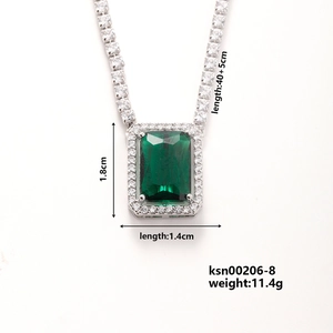 Detail of emerald-cut green zircon necklace with silver tennis chain and size info