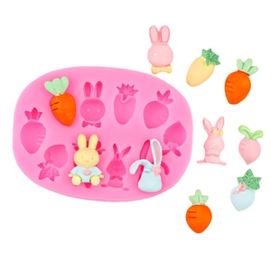 Pink silicone Easter bunny and carrot molds for fondant and chocolate cake decoration