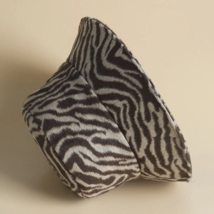 Detailed view of the soft zebra print texture and structured brim of this winter bucket hat