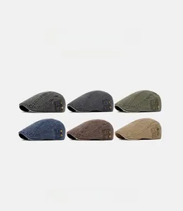 Detailed grid of vintage washed canvas newsboy hats in six classic retro colors
