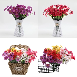 Artificial violet silk flower arrangements in diverse colors and decorative baskets