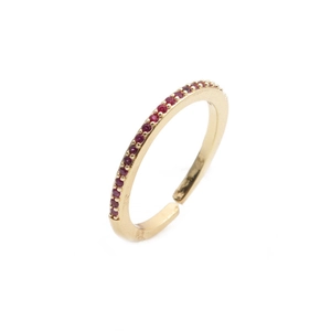 Adjustable gold ring featuring a row of sparkling red cubic zirconia in a vintage style