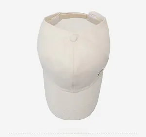 Top view of cream open-top baseball cap with adjustable strap and side detail