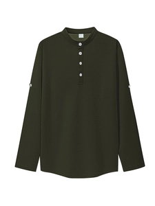 Detail of dark green waffle knit fabric and white buttons on long sleeve polo shirt
