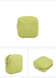 Detailed views of a green corduroy makeup pouch from front, side and top angles