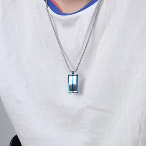 Men's titanium steel rectangle pendant necklace in blue and silver on model